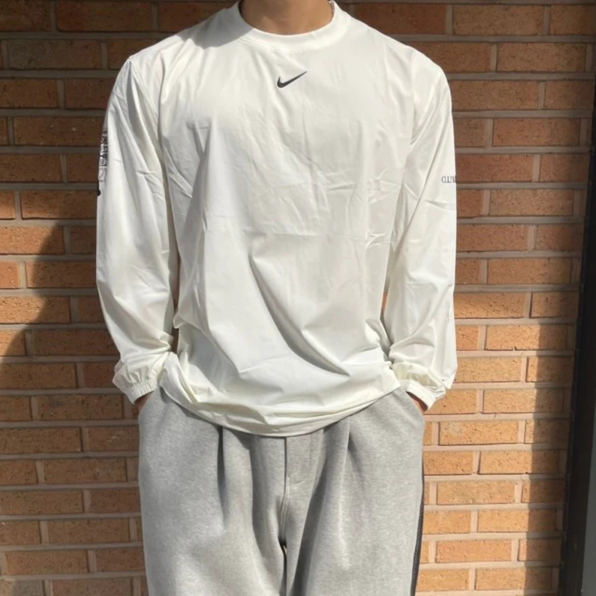 나이키 X 드레이크 녹타 골프 크루넥 탑 착용 이미지